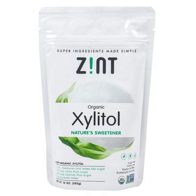 Zint Xylitol Nature's Sweetener, Organic non-GMO sweetener from corn, shown in a resealable bag with green leaf design.